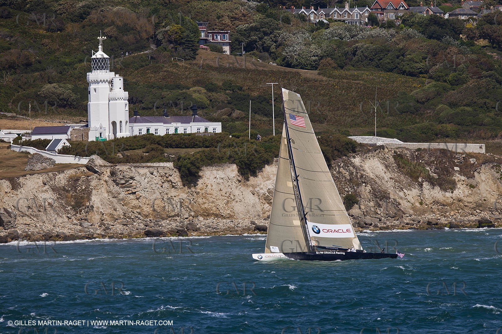 05 08 2010 - Cowes (UK, IOW) - The 1851 Cup -  BMW ORACLE Racing - Round The Island Race - Passing Ste Catherine Lighthouse