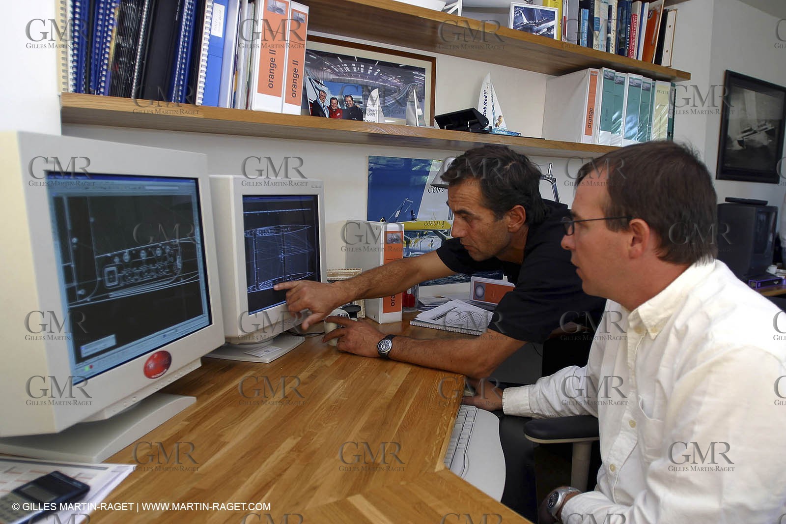 Vannes - Multiplast Boatyard - Bruno Peyron and Yan Penfornis working on Orange II design