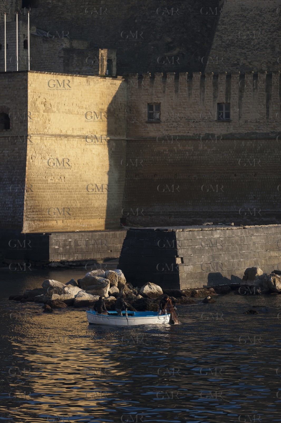 24 02 2012 - Naples (ITA) - 34th America's Cup - America's Cup World Series Naples 2012 - Naples Preview - Fishermen at Castel Dell Ovo