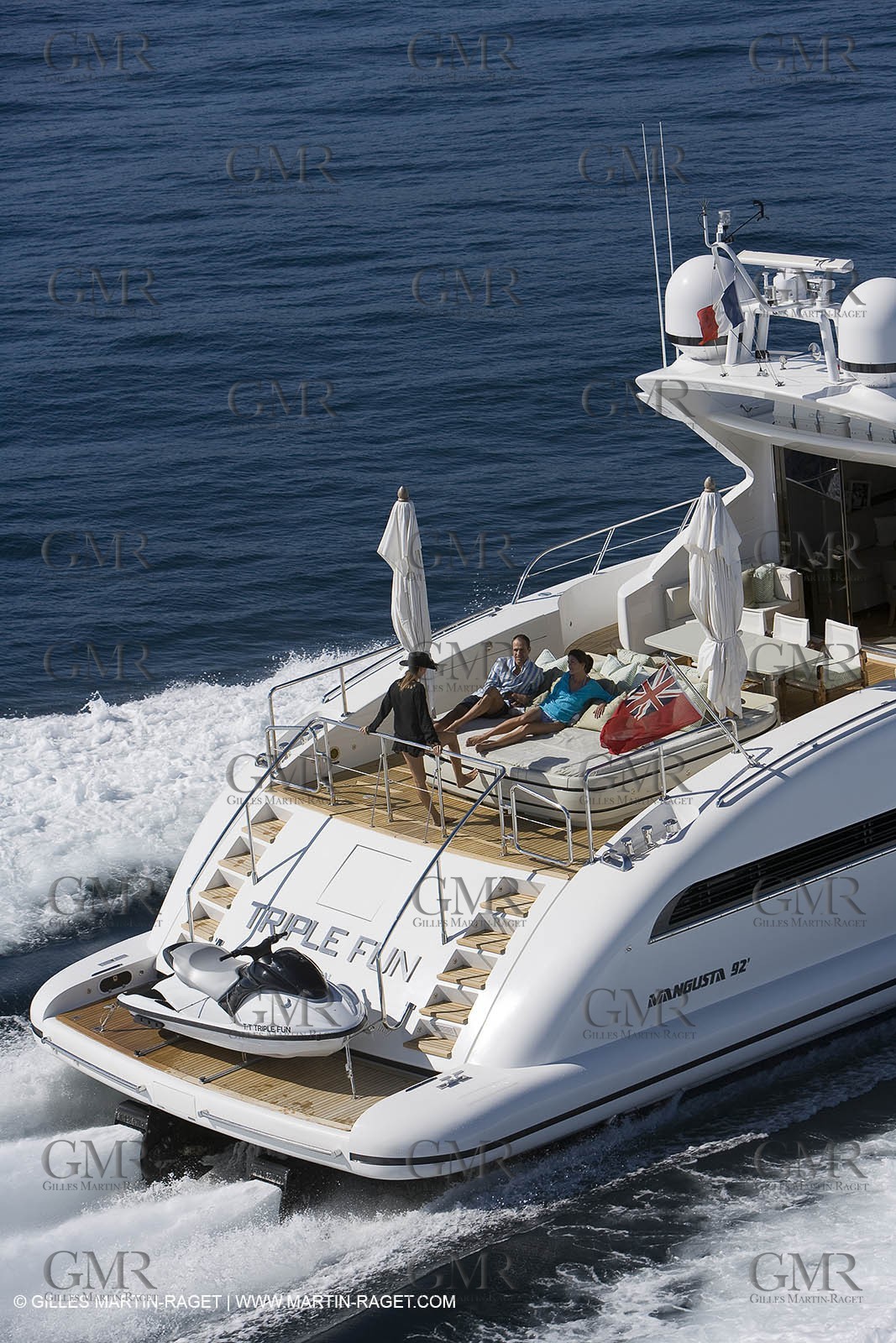 06 09 2007 - Saint Tropez (FRA, 83) - Superyachts - Motoryachts - Mangusta 92 Triple Fun in Saint Tropez - Mooring at Club 55 at Pampelonne Beach