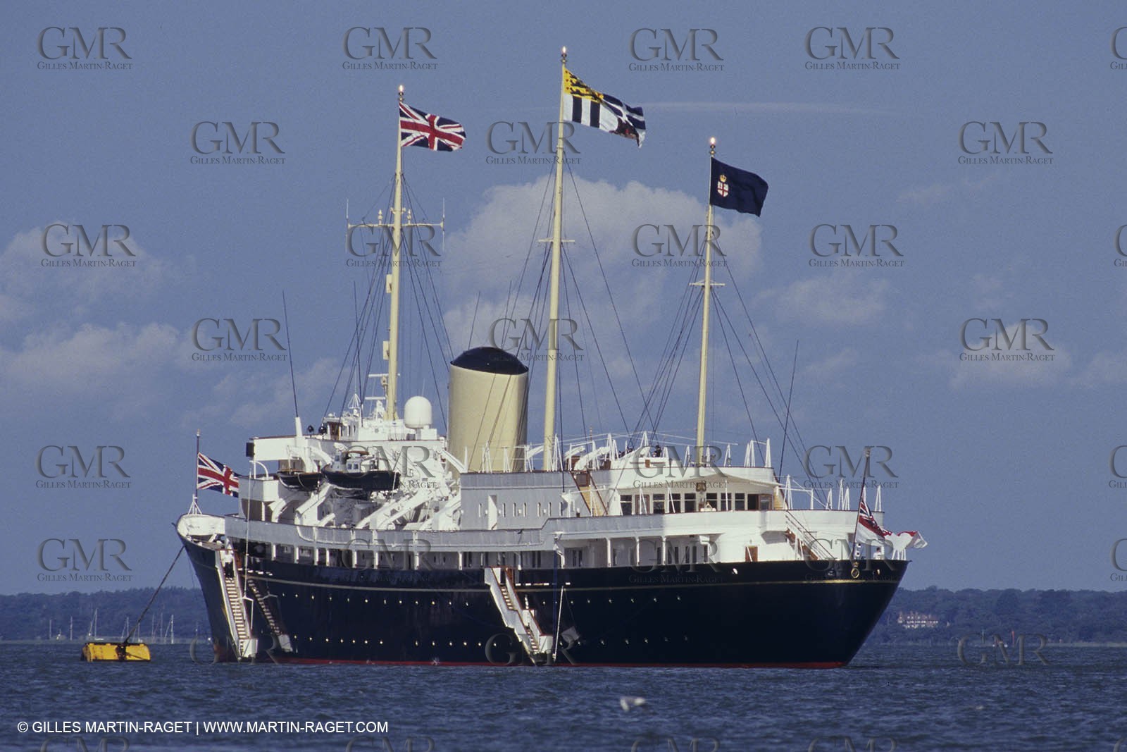 Classic motor yachts - Britannia moored in the Solent off Cowes during the Cowes Week