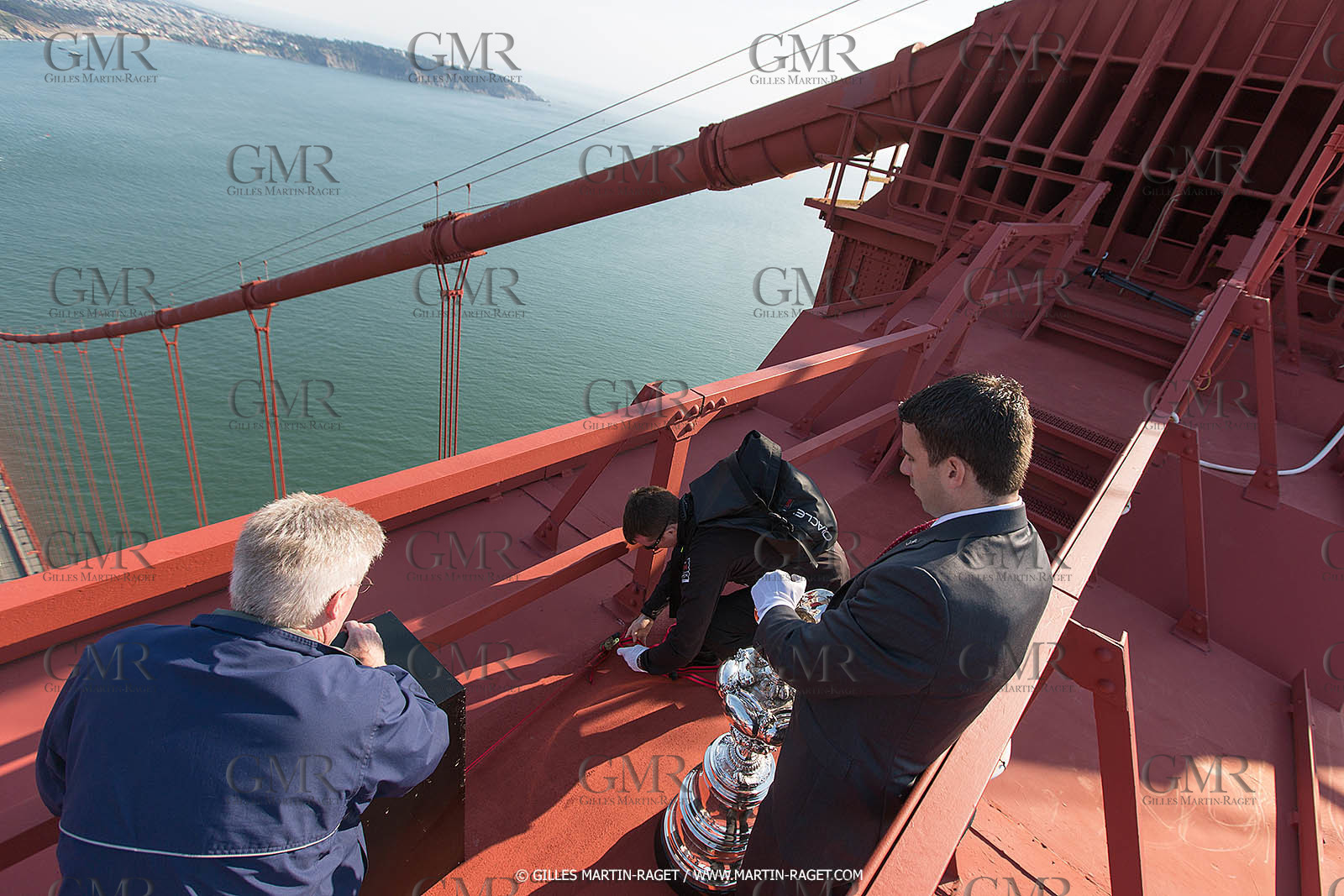 03 07 2013 - San Francisco (USA, CA) - 34th America's Cup - The America's Cup Trophy at the top of Golden Gate Bridge