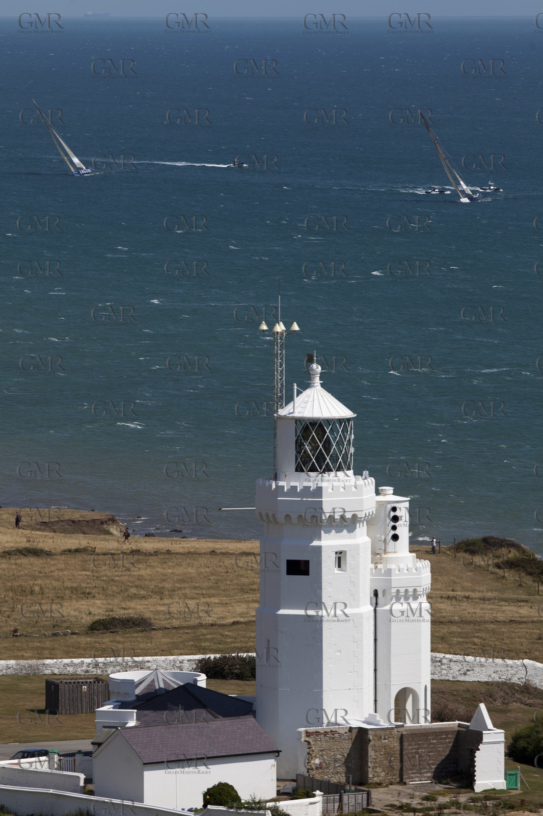 05 08 2010 - Cowes (UK, IOW) - The 1851 Cup -  BMW ORACLE Racing - Round The Island Race - Passing Ste Catherine Lighthouse