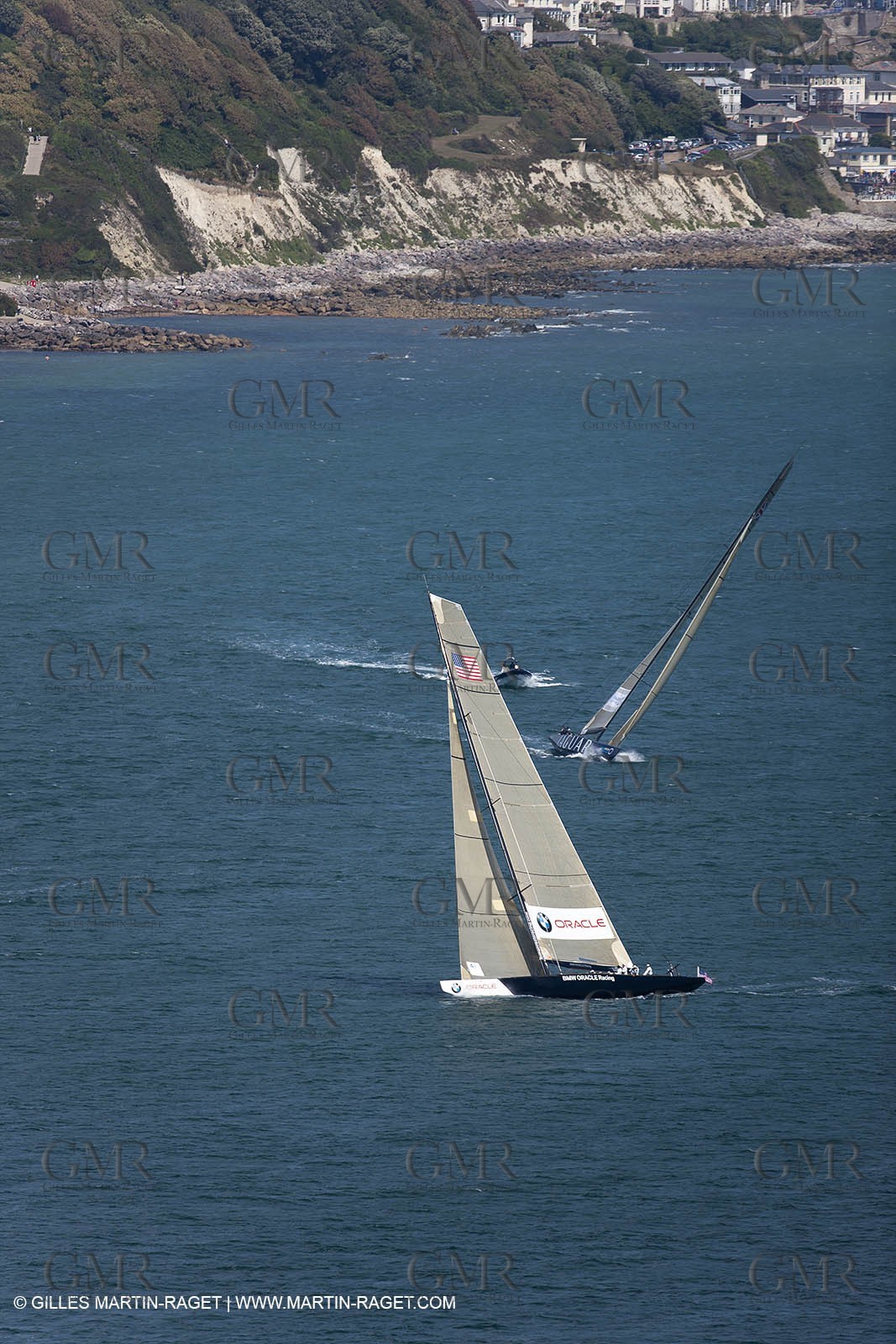 05 08 2010 - Cowes (UK, IOW) - The 1851 Cup -  BMW ORACLE Racing - Round The Island Race - Passing Ste Catherine Lighthouse