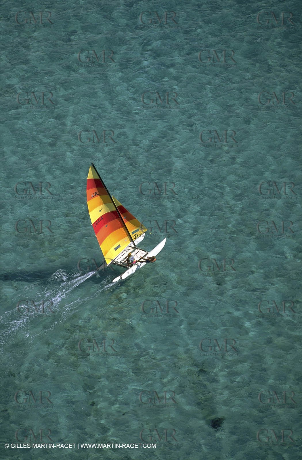catamaran in blue waters