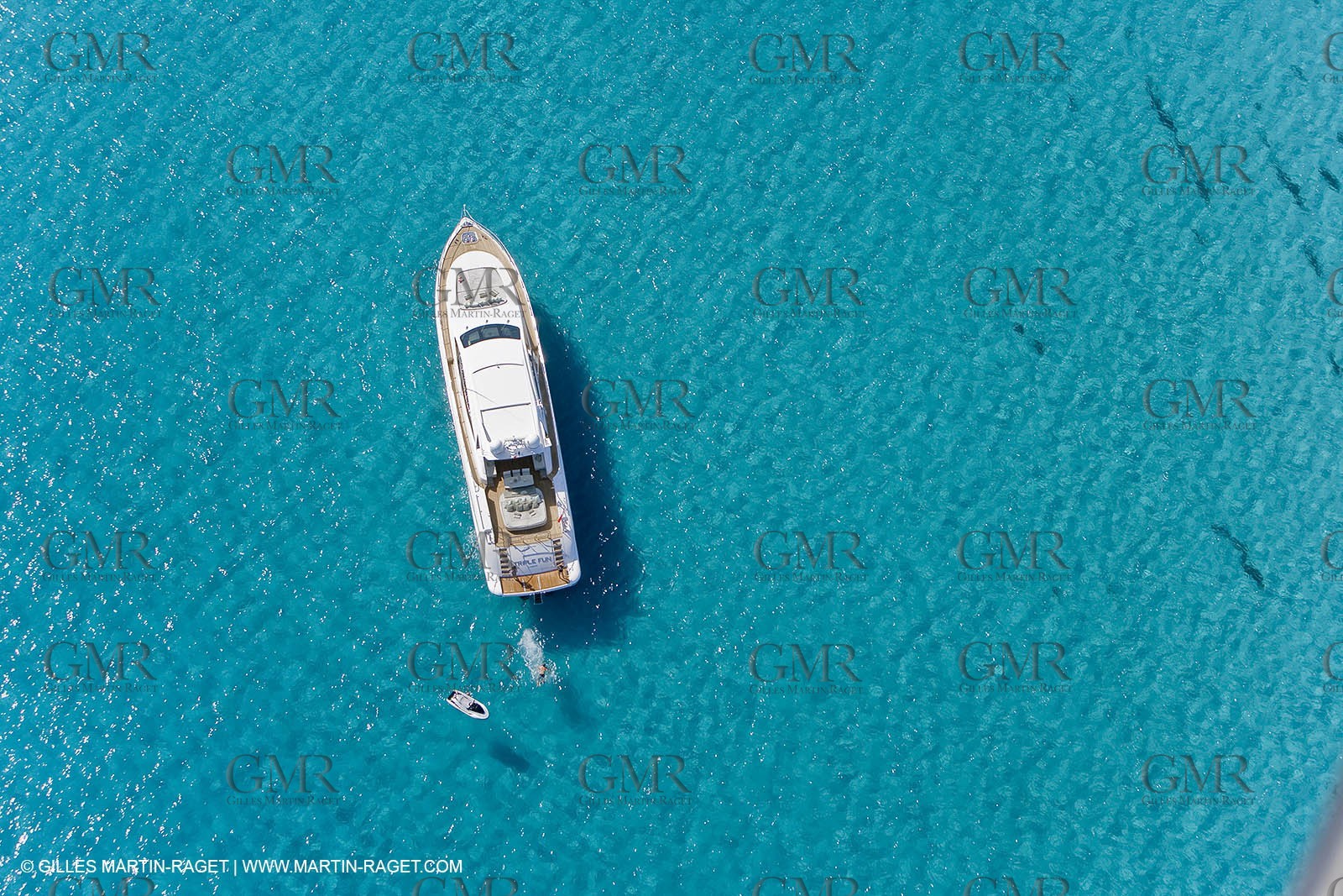 06 09 2007 - Saint Tropez (FRA, 83) - Superyachts - Motoryachts - Mangusta 92 Triple Fun in Saint Tropez - Mooring at Club 55 at Pampelonne Beach