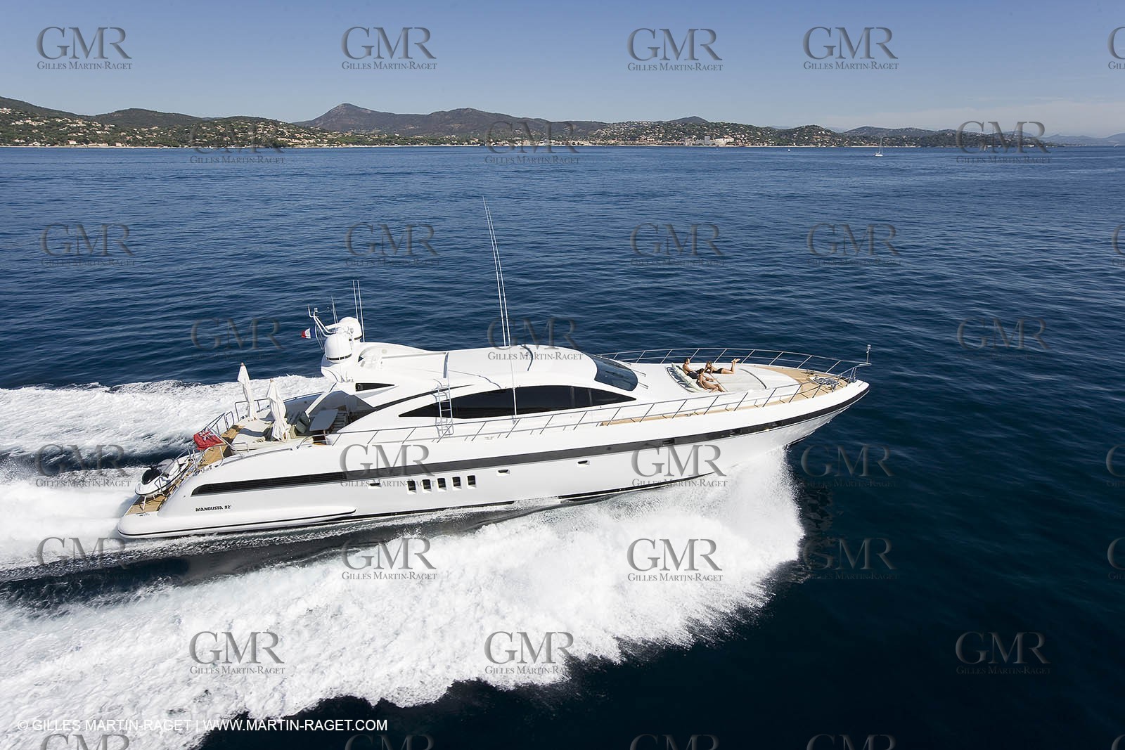 06 09 2007 - Saint Tropez (FRA, 83) - Superyachts - Motoryachts - Mangusta 92 Triple Fun in Saint Tropez - Mooring at Club 55 at Pampelonne Beach