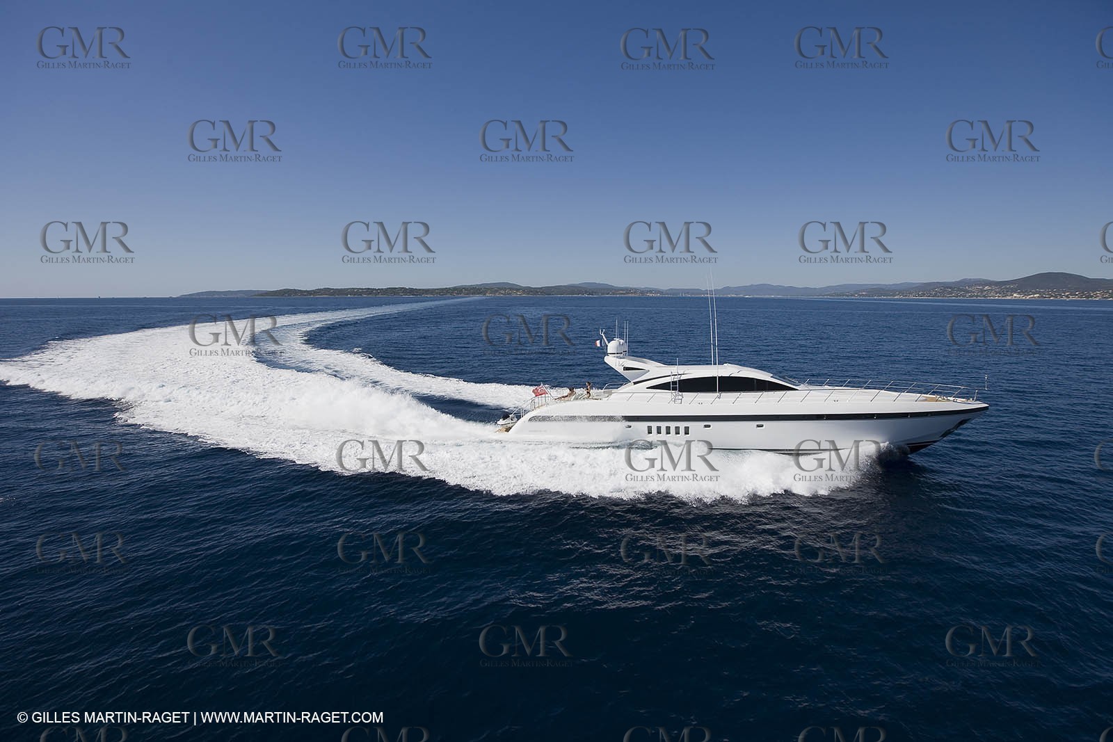 06 09 2007 - Saint Tropez (FRA, 83) - Superyachts - Motoryachts - Mangusta 92 Triple Fun in Saint Tropez - Mooring at Club 55 at Pampelonne Beach