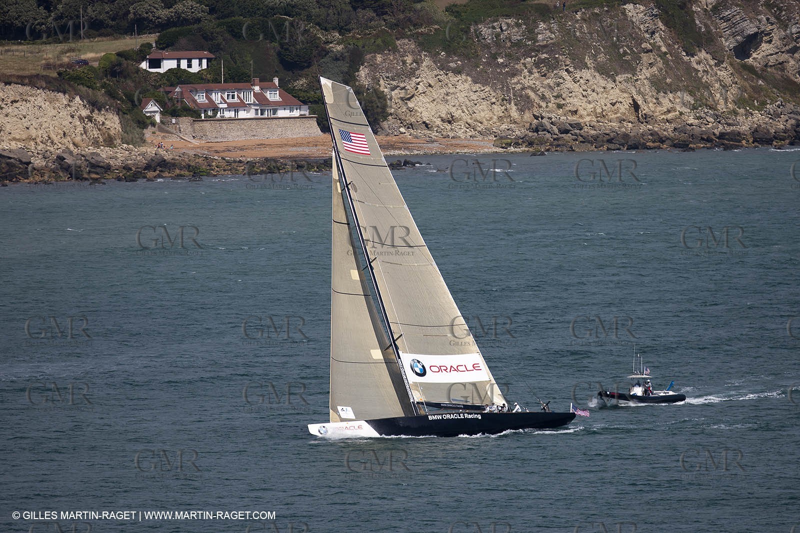 05 08 2010 - Cowes (UK, IOW) - The 1851 Cup -  BMW ORACLE Racing -  - Round The Island Race - Passing Ste Catherine Lighthouse.