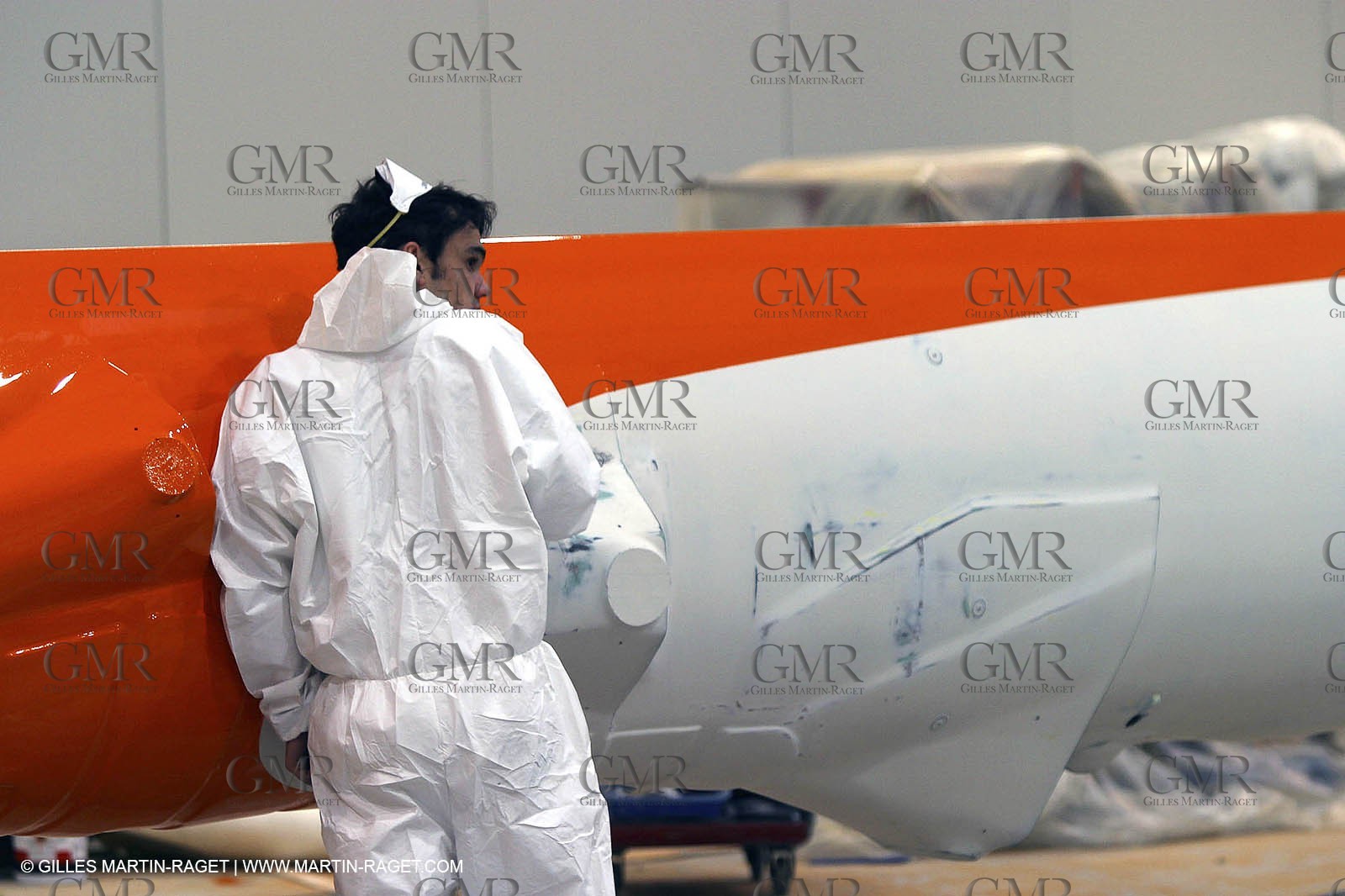 Vannes - Multiplast Boatyard - Orange II going out of the shed