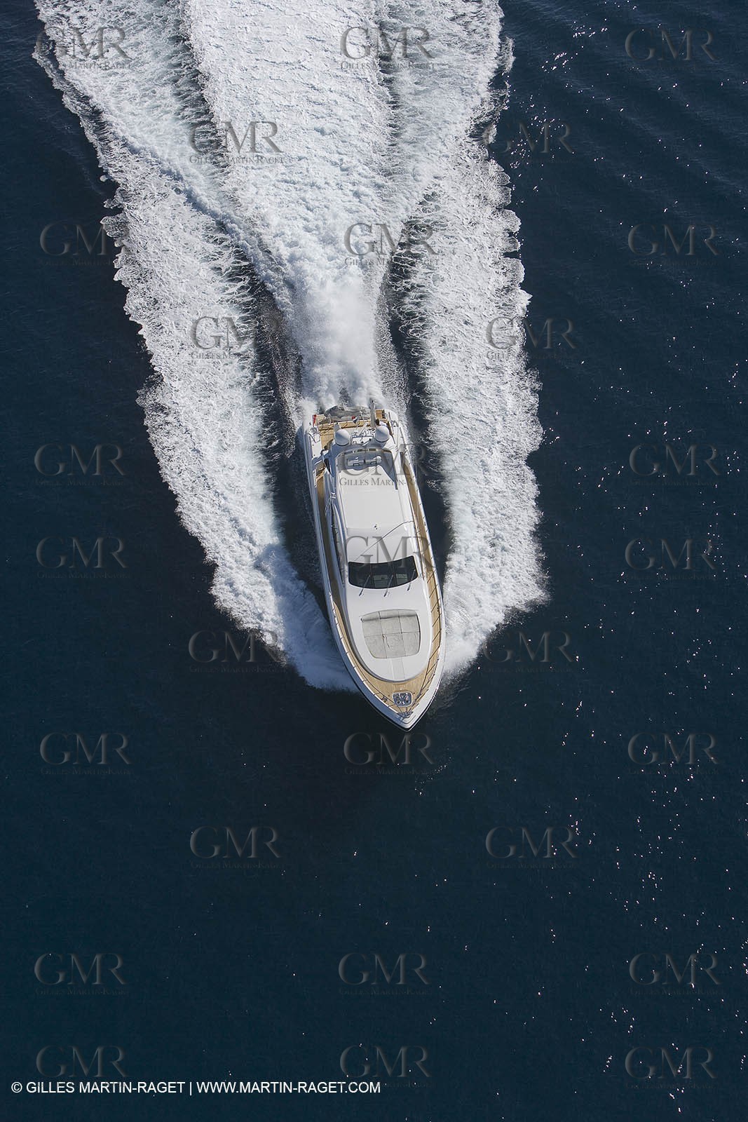 06 09 2007 - Saint Tropez (FRA, 83) - Superyachts - Motoryachts - Mangusta 92 Triple Fun in Saint Tropez - Mooring at Club 55 at Pampelonne Beach