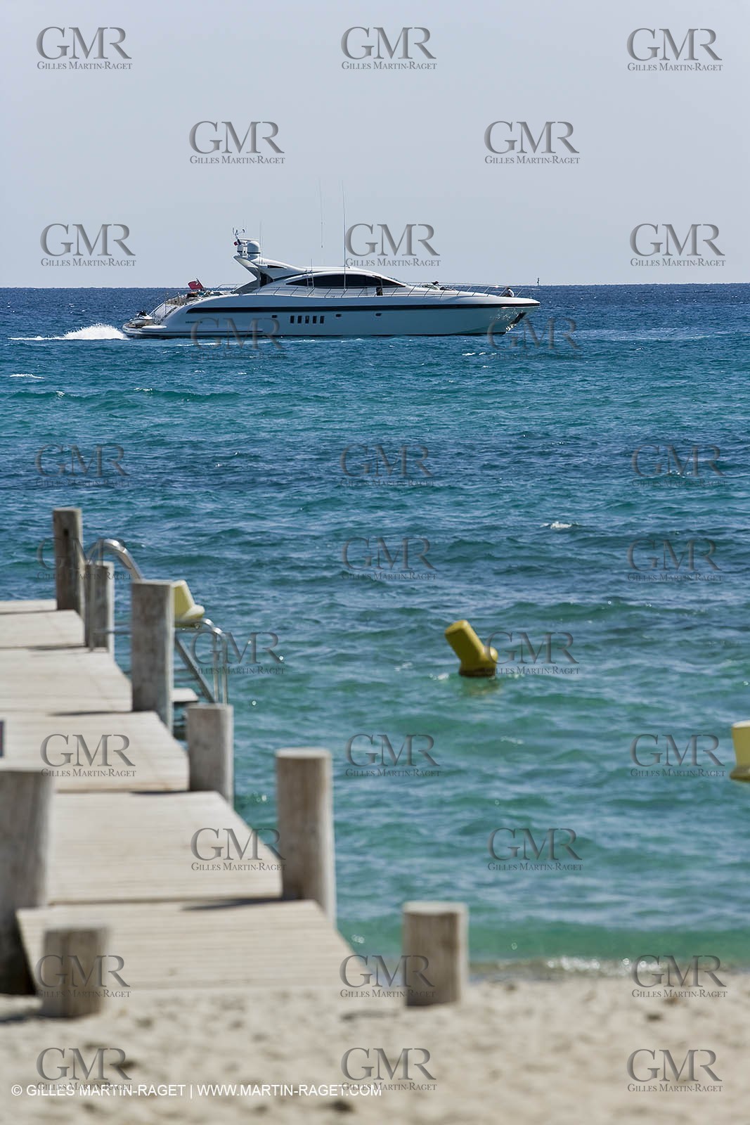 06 09 2007 - Saint Tropez (FRA, 83) - Superyachts - Motoryachts - Mangusta 92 Triple Fun in Saint Tropez - Mooring at Club 55 at Pampelonne Beach