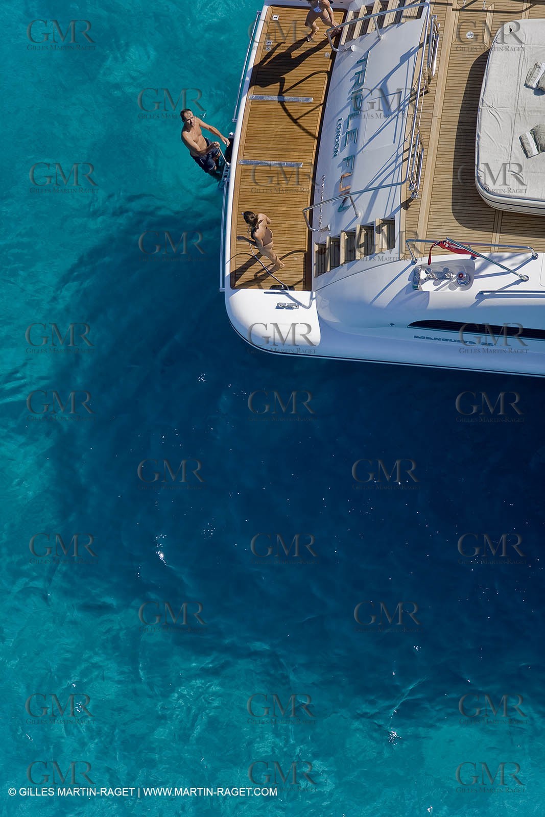 06 09 2007 - Saint Tropez (FRA, 83) - Superyachts - Motoryachts - Mangusta 92 Triple Fun in Saint Tropez - Mooring at Club 55 at Pampelonne Beach
