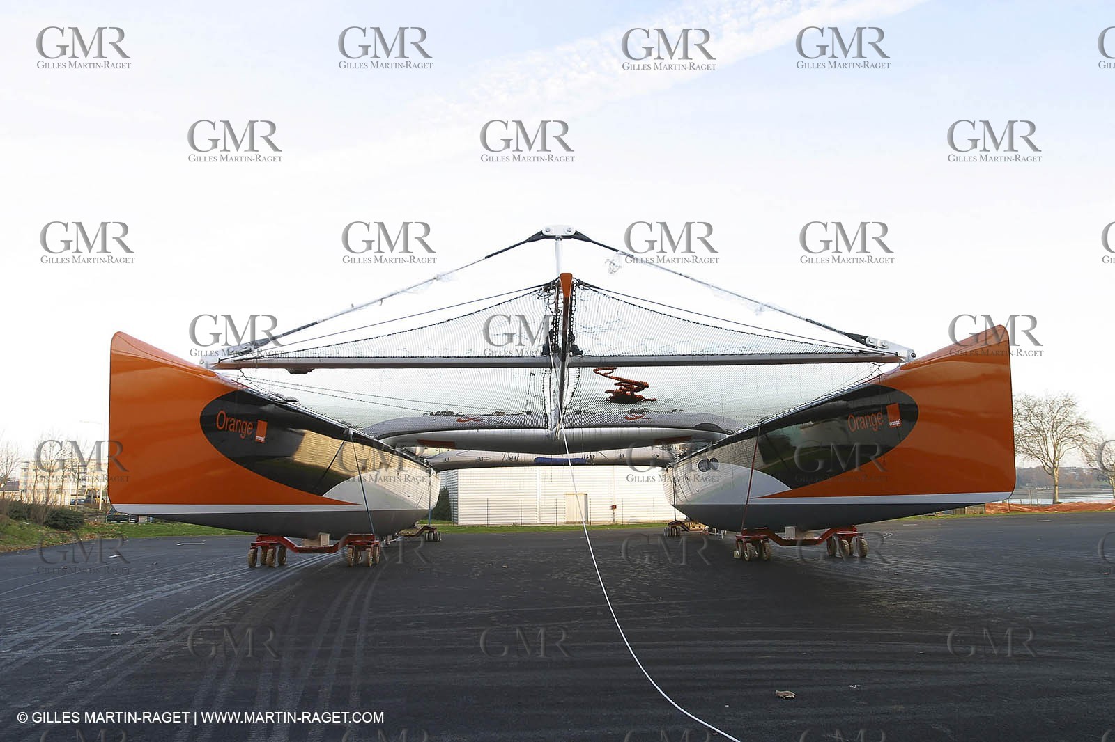 Vannes - Multiplast Boatyard - Orange II going out of the shed