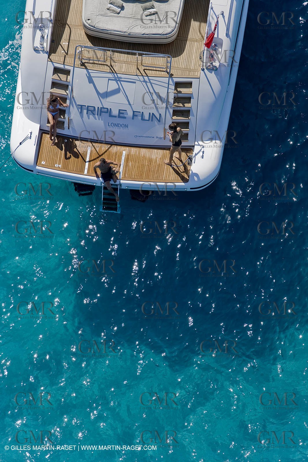 06 09 2007 - Saint Tropez (FRA, 83) - Superyachts - Motoryachts - Mangusta 92 Triple Fun in Saint Tropez - Mooring at Club 55 at Pampelonne Beach