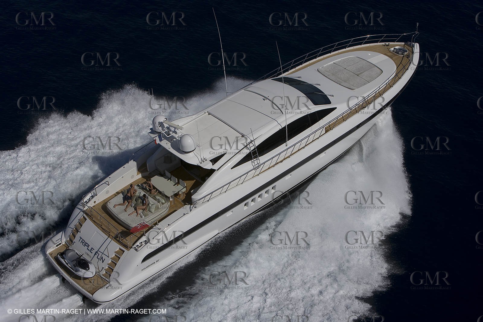 06 09 2007 - Saint Tropez (FRA, 83) - Superyachts - Motoryachts - Mangusta 92 Triple Fun in Saint Tropez - Mooring at Club 55 at Pampelonne Beach